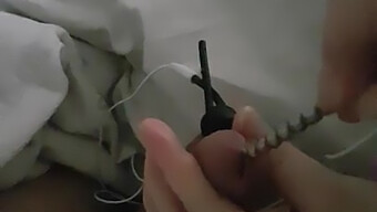 A Nurse And Her Husband Enjoy Playing With Electro Stimulation On His Penis