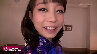 A Stunning Girl With Big Eyes In A Cheongsam Gives A Sexy Performance