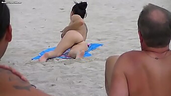 Amateur couple's beach exhibitionism caught on camera