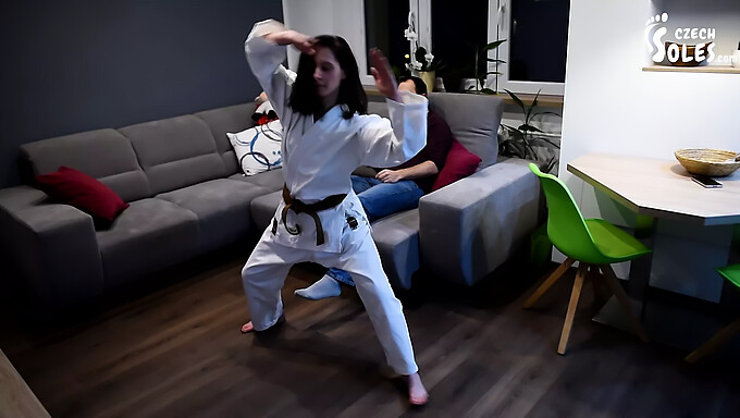 Karate kick and domination in fetish video