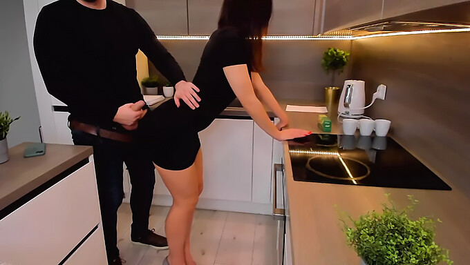 Amateur couple engages in homemade kitchen sex with intense orgasm