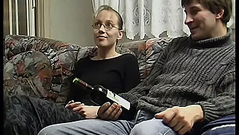 A Young Couple In The 90s Indulge In Intense Pleasure On The Couch