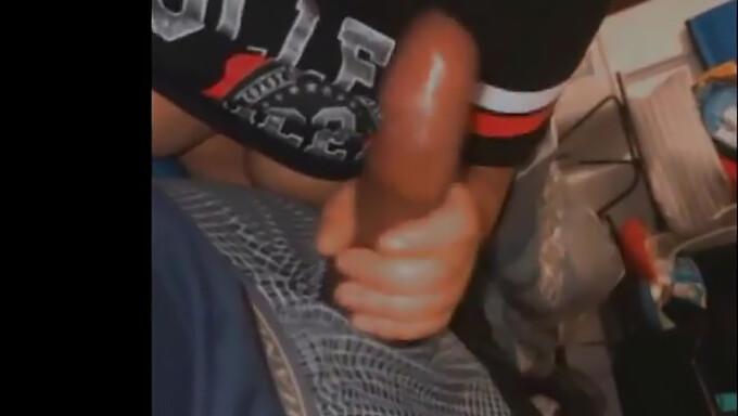 Sucking and stroking a huge penis to please him