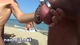 Swinging couples engage in group sex and piss play on a French beach